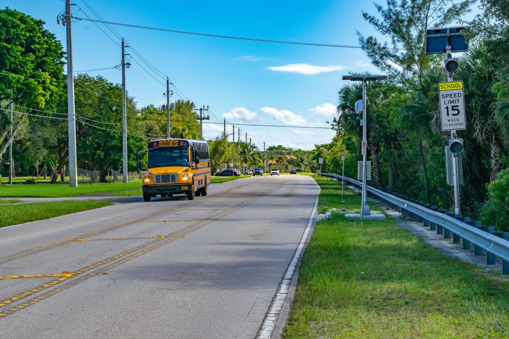 School speed cameras and zone signs near the J.C. Mitchell Elementary School. (Photo: Boca Daily News)