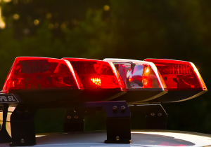 Yamato Road Crash Leaves Passenger Dead, Driver in Critical Condition 2 Police Lights (Photo: Jason Rojas/Flickr)