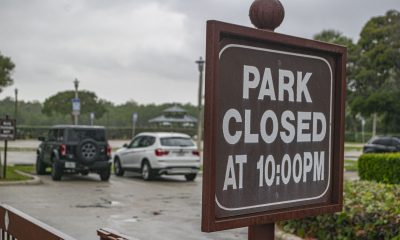 A sign notifying visitors of the hours at a Boca Raton, FL city park. (Photo: Boca Daily News)