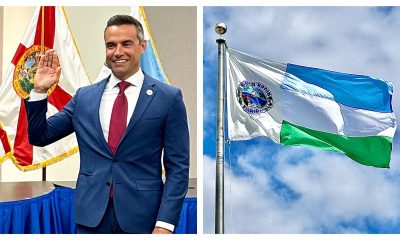 Andy Thomson (left) and the Boca Raton city flag.