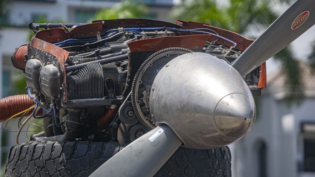 A Piper Twin Comanche PA-39 (PA-30 variant) at a boat ramp in Boca Raton, FL, being prepared to be removed by a crane after landing in the ocean, Aug. 23, 2026. (Photo: Boca Daily News)