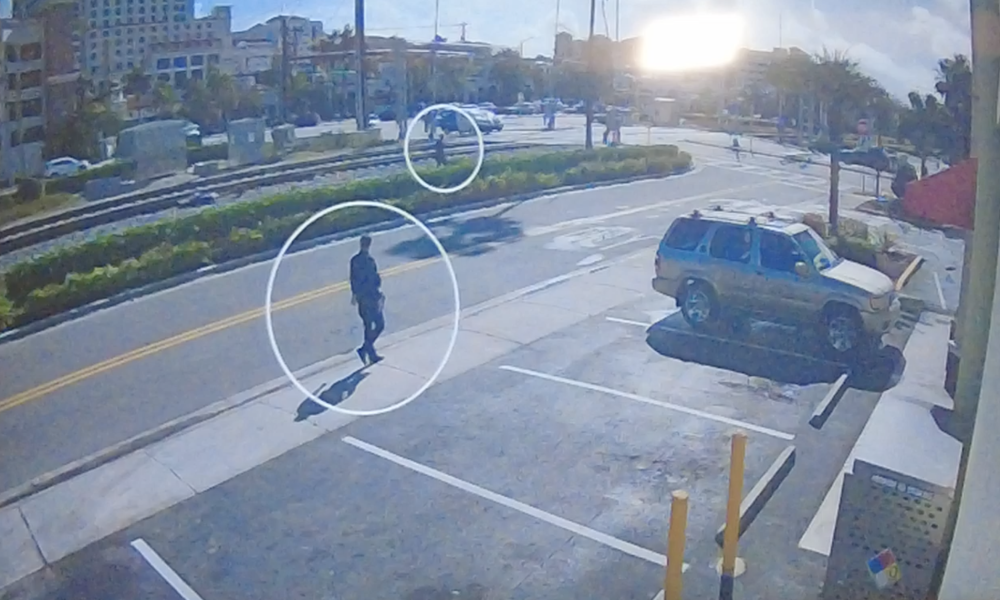 Surveillance footage capturing a fatal police shooting in Boca Raton, FL, Dec. 2024, as released in Oct. 2026. (Boca Daily News)