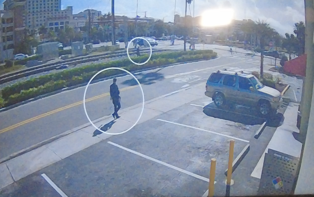 Surveillance footage capturing a fatal police shooting in Boca Raton, FL, Dec. 2024, as released in Oct. 2026. (Boca Daily News)